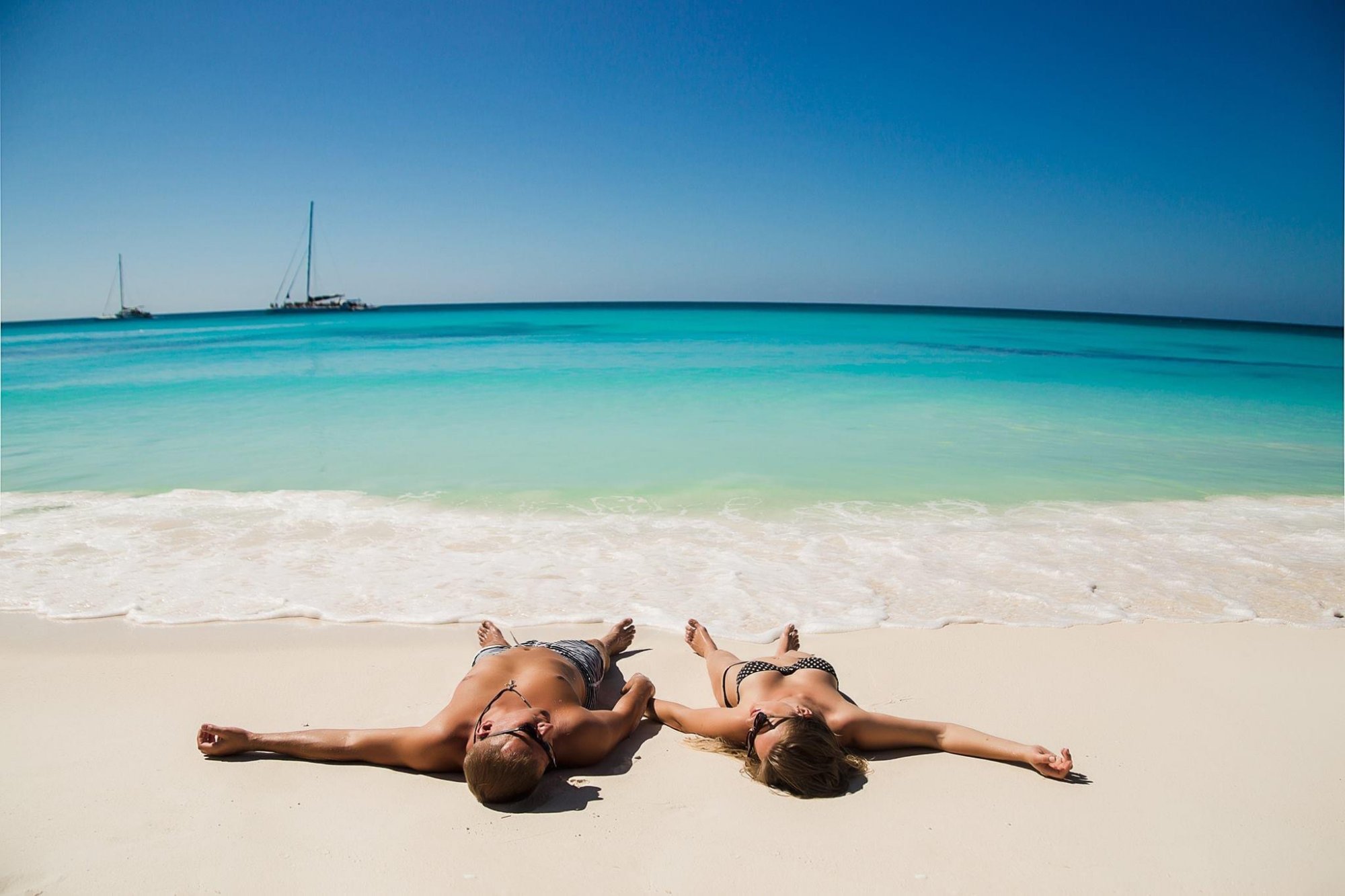 Couple relaxing on Saona Island